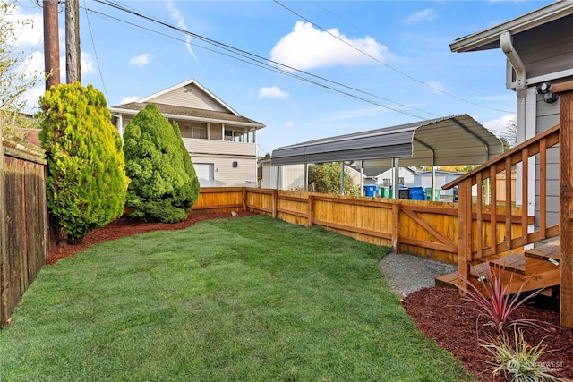 view of yard with a carport