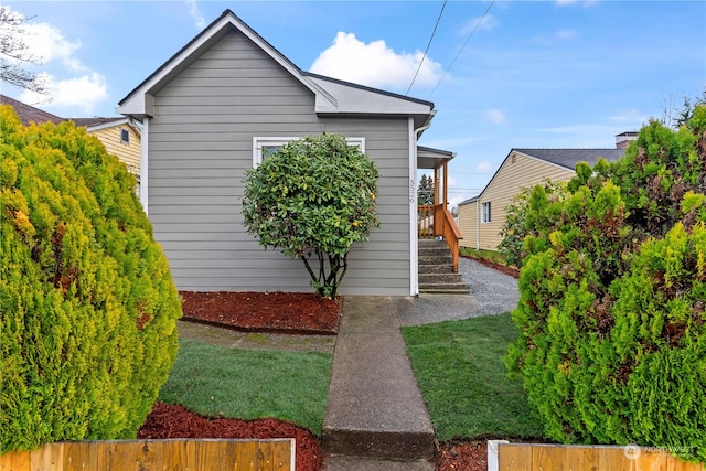 view of property exterior featuring a yard