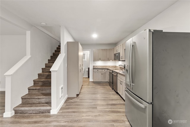 kitchen featuring light wood-type flooring and stainless steel appliances