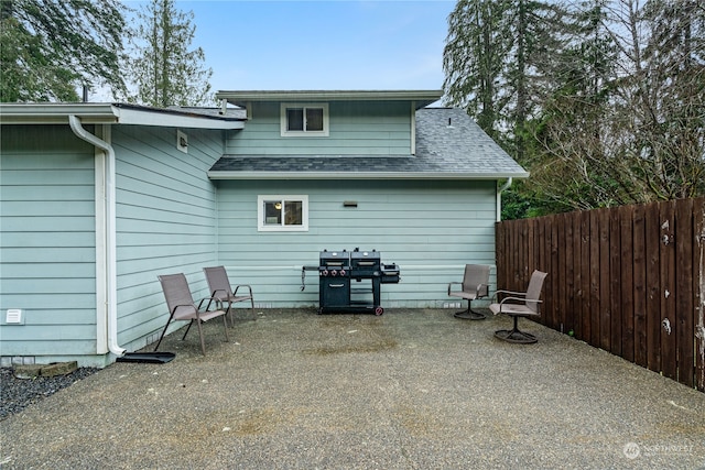 back of property featuring a patio