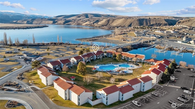 aerial view with a water and mountain view