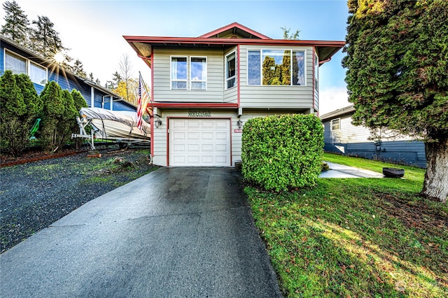 view of front of property with a garage