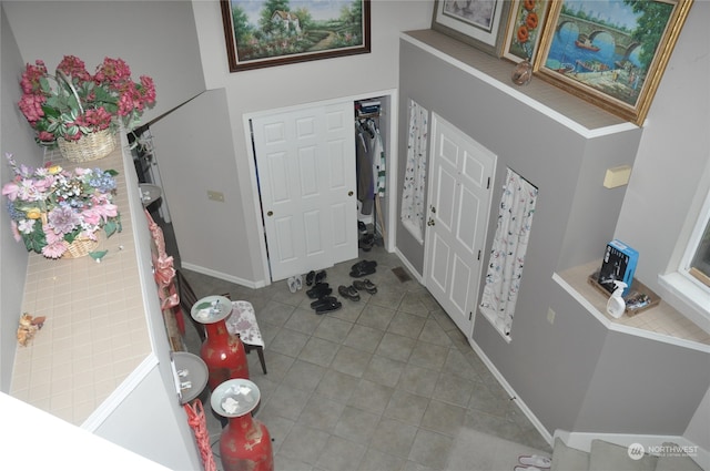 view of tiled foyer entrance