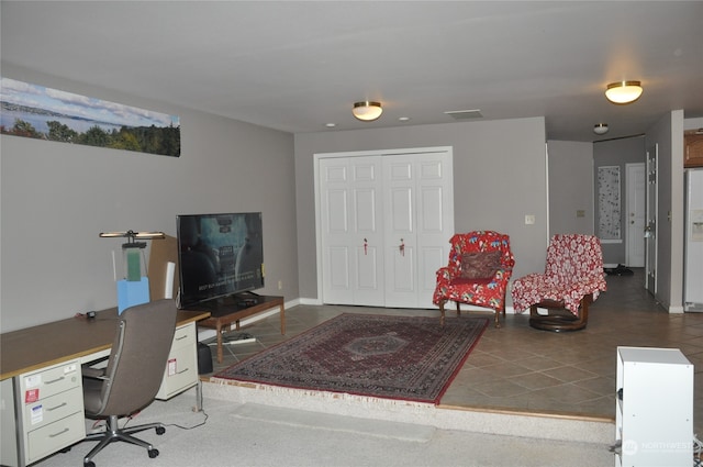 office with dark tile patterned floors