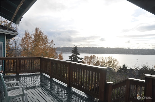 deck featuring a water view