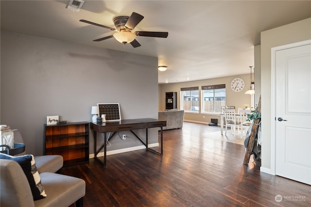 office area featuring ceiling fan and dark wood-type flooring