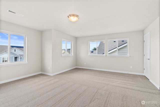 view of carpeted spare room