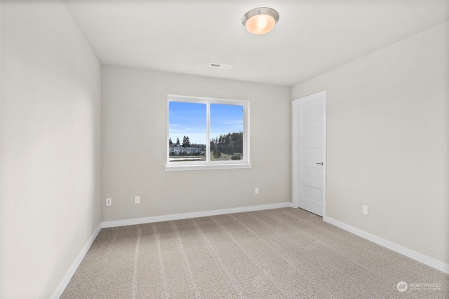 empty room with carpet floors