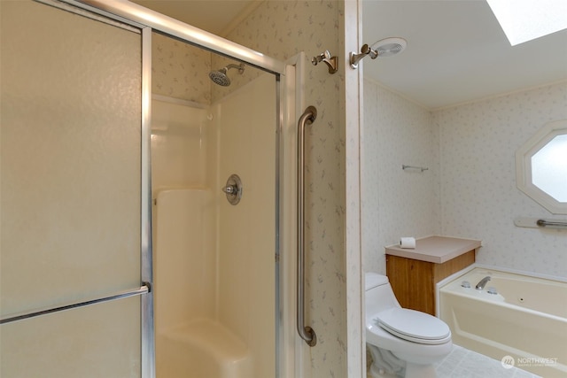 bathroom featuring shower with separate bathtub and toilet