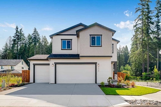 3313 SE 12th Ave, Battle Ground, WA 98604 - view of front of home with concrete driveway and an attached garage