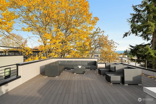 wooden deck featuring an outdoor living space