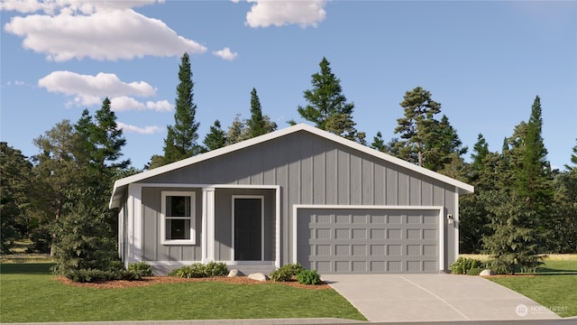 view of front of home with a front lawn and a garage