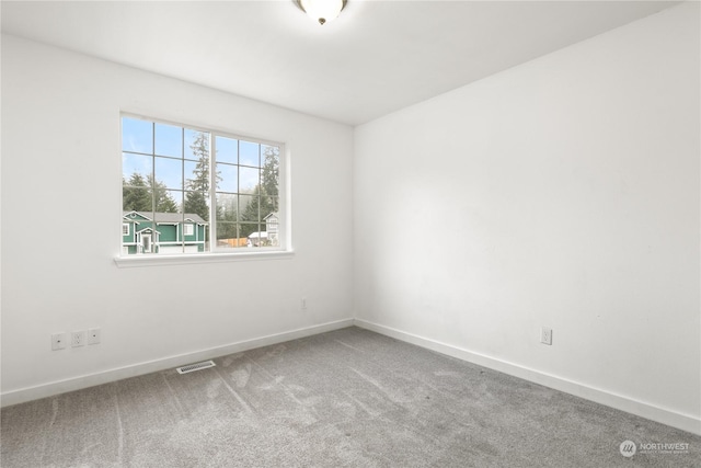 view of carpeted spare room