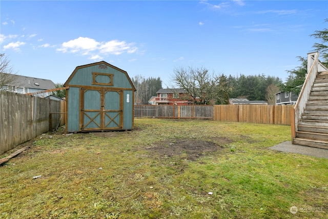 view of yard with a storage shed