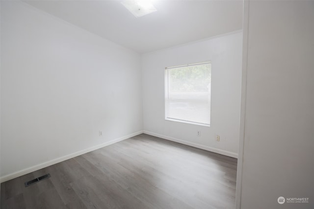 empty room featuring hardwood / wood-style floors