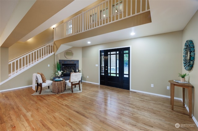 entrance foyer with hardwood / wood-style floors