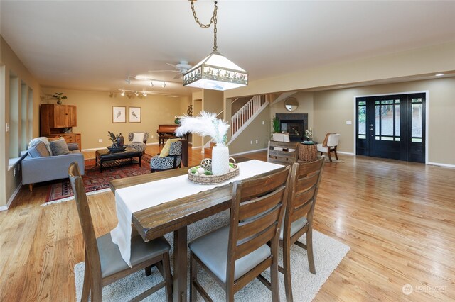 dining room with light wood-type flooring