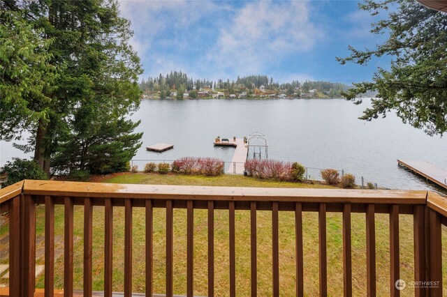 property view of water with a dock