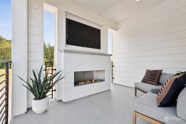 13730 SE 84th St Unit 13, Newcastle, WA 98059 - living room with speckle patterned floor and an outdoor brick fireplace