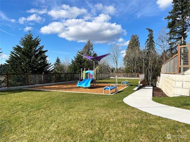 view of play area featuring a yard