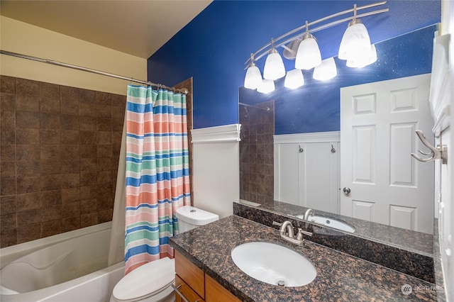 full bathroom featuring shower / bath combo, toilet, and vanity