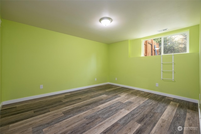 unfurnished room featuring dark hardwood / wood-style floors