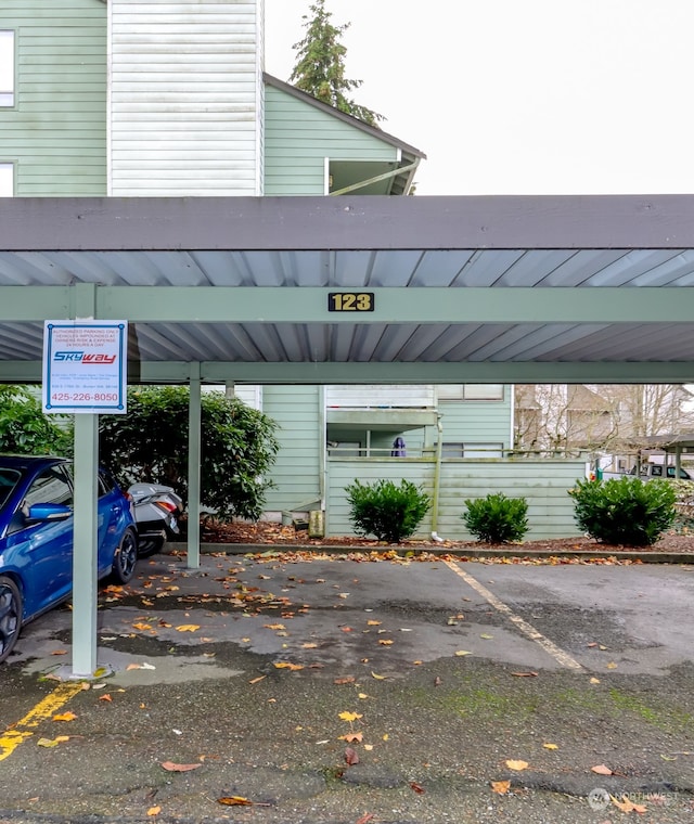 view of parking with a carport