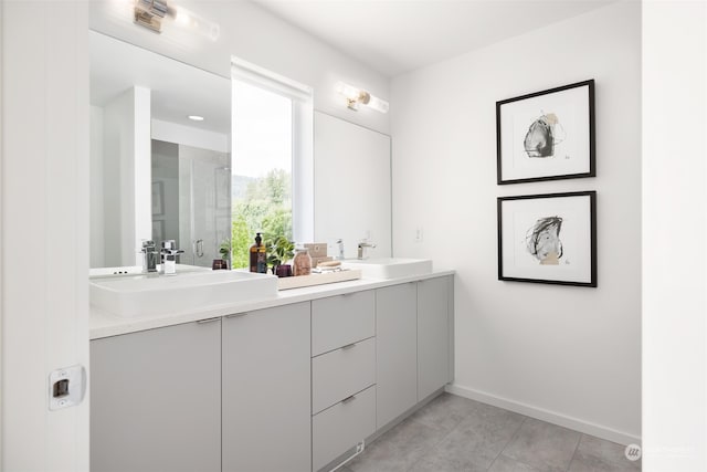 bathroom featuring tile patterned floors and vanity