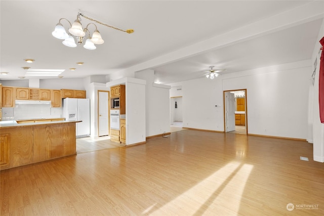 1100 S Rosewood Dr Unit 405, Ellensburg, WA 98926 - unfurnished living room with light wood-type flooring, a ceiling fan, a chandelier, and baseboards