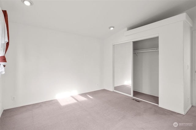1100 S Rosewood Dr Unit 405, Ellensburg, WA 98926 - unfurnished bedroom featuring carpet floors and a closet
