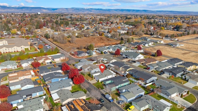 1100 S Rosewood Dr Unit 405, Ellensburg, WA 98926 - aerial view of residential area featuring a mountain backdrop