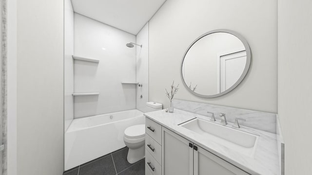 bathroom with tile patterned floors, shower / tub combination, toilet, and vanity