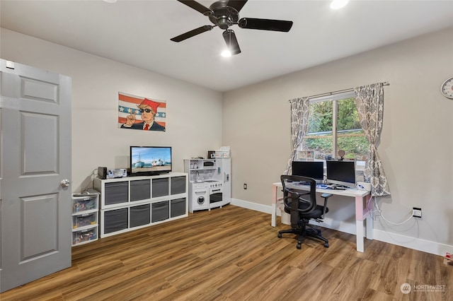 office featuring hardwood / wood-style floors and ceiling fan