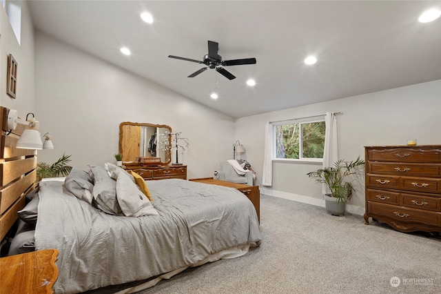 bedroom with vaulted ceiling, ceiling fan, and carpet