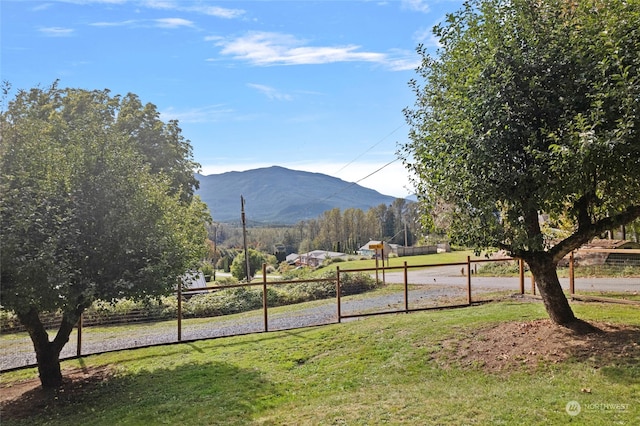 mountain view featuring a rural view