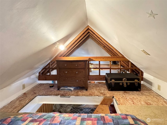 bedroom with vaulted ceiling