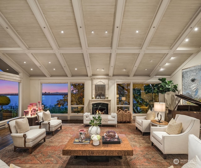 living room featuring beamed ceiling and coffered ceiling