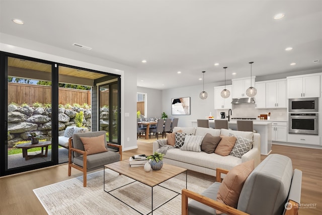 living room featuring light hardwood / wood-style floors