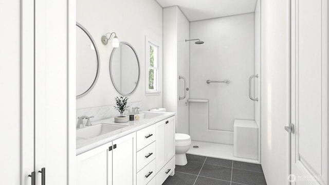 bathroom with tile patterned floors, toilet, double vanity, and a sink