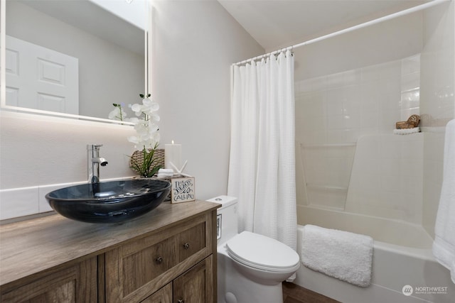 full bathroom with toilet, shower / tub combo, vanity, and vaulted ceiling