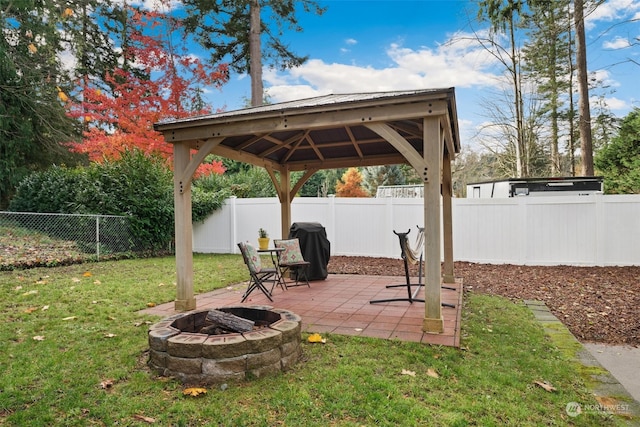 view of yard featuring a gazebo, an outdoor fire pit, and a patio