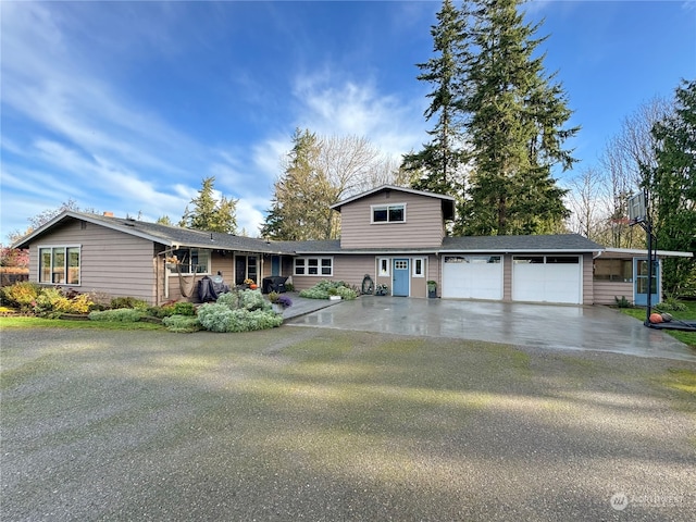 split level home featuring a garage