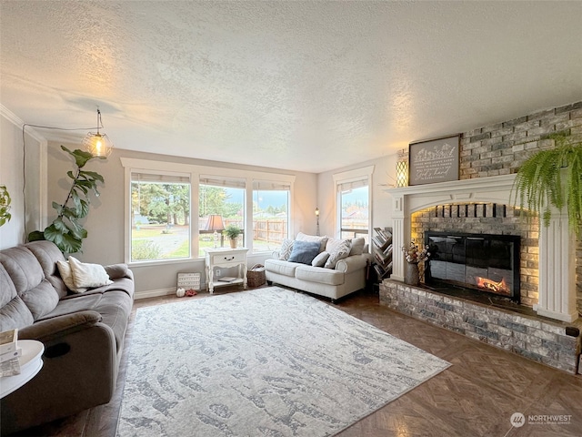 living room with a fireplace, a textured ceiling, and dark parquet floors