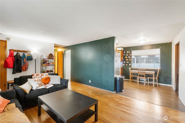 living room with hardwood / wood-style flooring