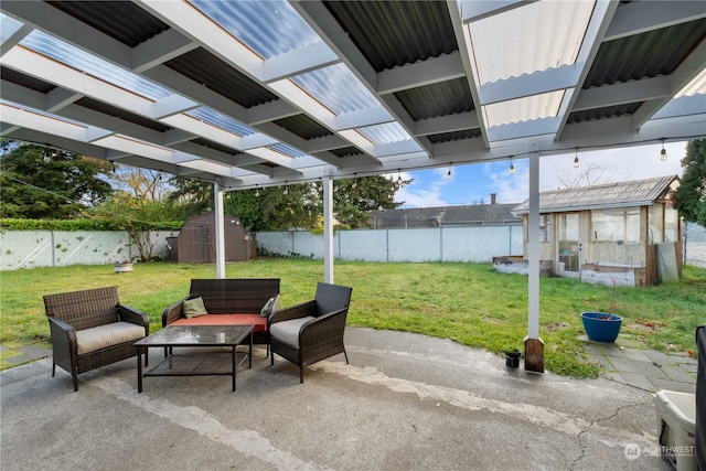 view of patio featuring a storage unit