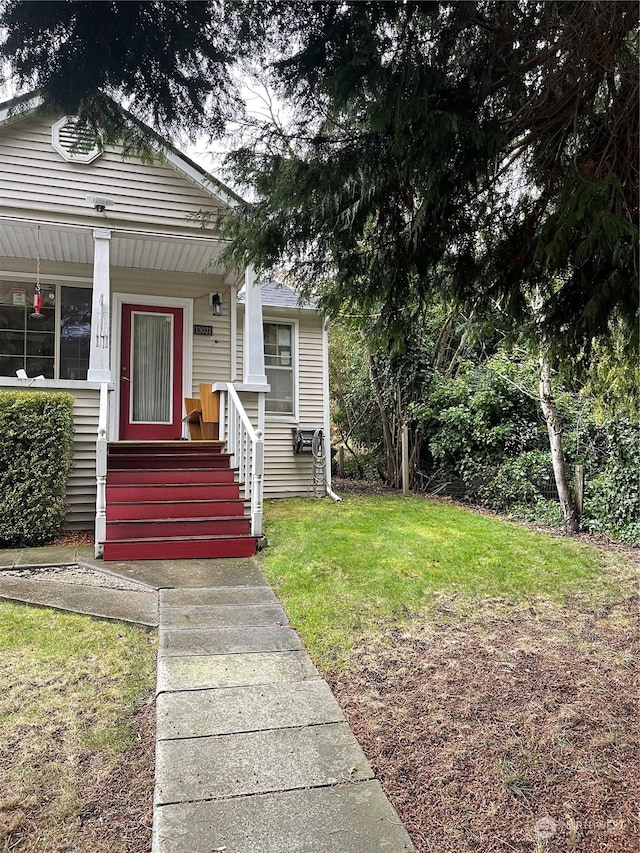 exterior space featuring a front lawn