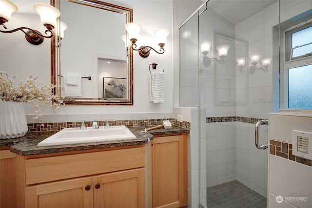 bathroom with vanity and walk in shower