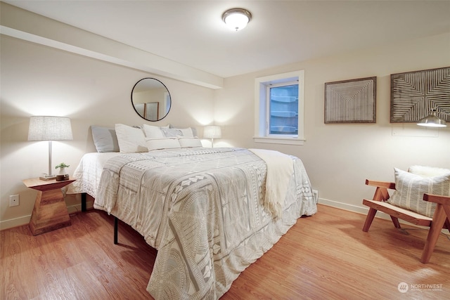 bedroom featuring hardwood / wood-style flooring