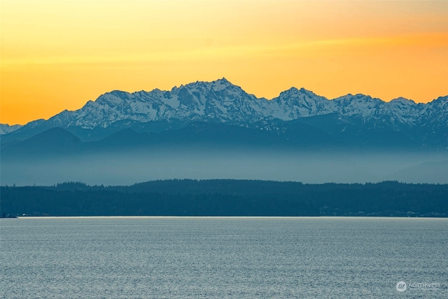 view of mountain feature featuring a water view