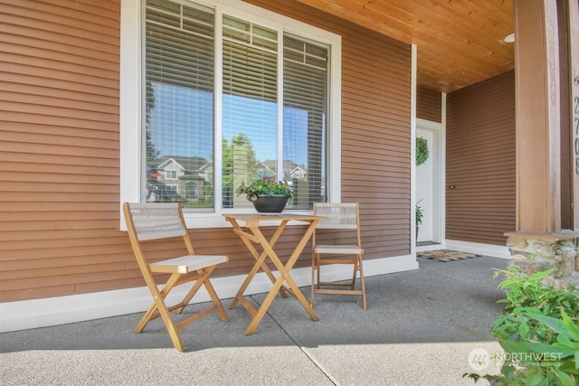 view of patio featuring a porch